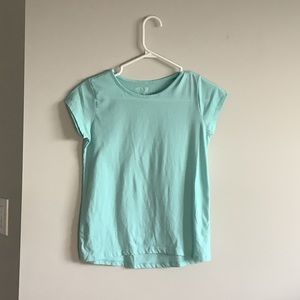 Sky blue shirt.